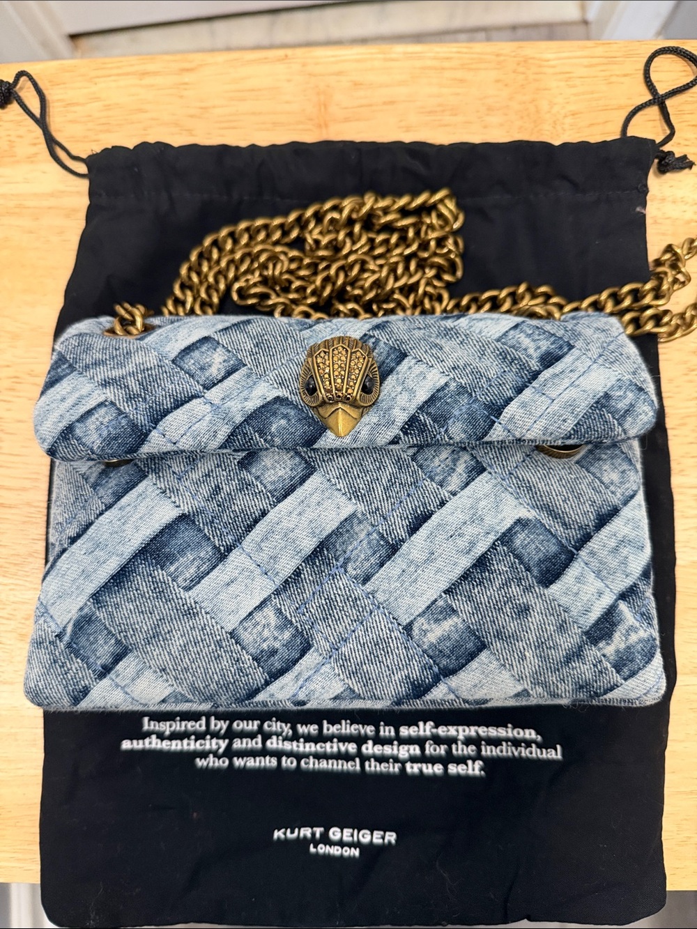 Kurt Geiger Light Blue Denim Woven Crossbody with Gold Chain